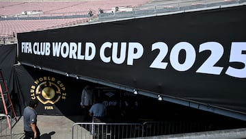People work at the Rose Bowl Stadium ahead of the Club World Cup 2025 football match between Paris Saint-Germain (PSG) and Atletico de Madrid in Pasadena, California, on June 12, 2025. (Photo by Yuri CORTEZ / AFP)
