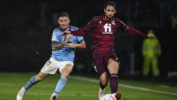VIGO, SPAIN - OCTOBER 28: Javi Galán of RC Celta and Adnan Januzaj of Real Sociedad in action during the LaLiga Santander match between RC Celta de Vigo and Real Sociedad at Abanca-Balaídos on October 28, 2021 in Vigo, Spain. (Photo by Octav