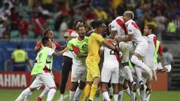 Peru's players celebrate after winning the penalty shoot-out against Uruguay during a Copa America quarterfinal soccer match at the Arena Fonte Nova in Salvador, Brazil, Saturday, June 29, 2019. (AP Photo/Ricardo Mazalan)
