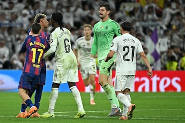 Police storm the pitch after fiery El Clásico brawl between Real Madrid and Barcelona