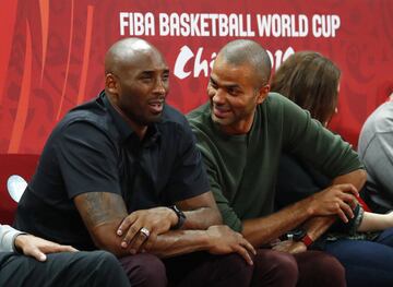 Kobe Bryant and Tony Parker take in the action.