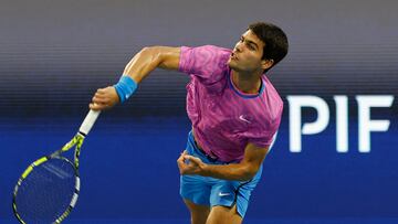 Carlos Alcaraz (ESP) hits a backhand.