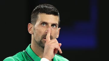 Serbia's Novak Djokovic reacts on a point to Netherlands' Botic van de Zandschulp during their men's singles match on day seven of the Australian Open tennis tournament in Melbourne on January 24, 2026. (Photo by Martin KEEP / AFP) / -- IMAGE RESTRICTED TO EDITORIAL USE - STRICTLY NO COMMERCIAL USE --