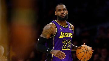 (FILES) LeBron James #23 of the Los Angeles Lakers in the first half at Crypto.com Arena on February 9, 2024 in Los Angeles, California. LeBron James became the first NBA player to reach 40,000 career regular-season points on March 2, 2024, the 39-year-old superstar scoring nine against defending champion Denver to achieve the milestone. (Photo by RONALD MARTINEZ / GETTY IMAGES NORTH AMERICA / AFP)