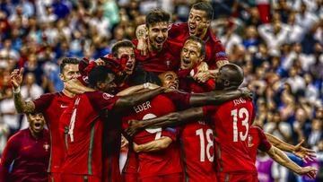 Football Soccer - Portugal v France - EURO 2016 - Final - Stade de France, Saint-Denis near Paris, France - 10/7/16
 Portugal&#039;s Eder and teammates celebrate after winning Euro 2016
 REUTERS/Michael Dalder
 Livepic