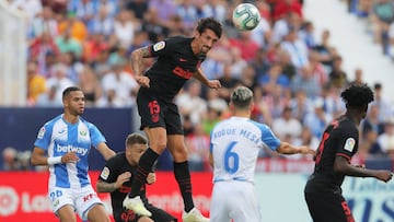Savic despeja contra el Leganés.