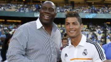 Cristiano, junto a Magic Johnson, el pasado verano.