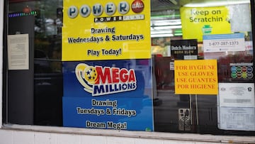 A lottery sign is displayed at a gas station as the Powerball lottery jackpot hits $1 billion in Doylestown, Pennsylvania, U.S. October 31, 2022.  REUTERS/Hannah Beier