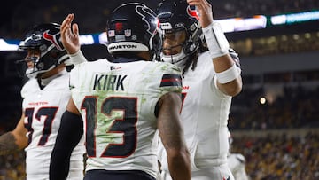 PITTSBURGH, PENNSYLVANIA - JANUARY 12: Christian Kirk #13 of the Houston Texans and C.J. Stroud #7 of the Houston Texans celebrate after a touchdown in the second quarter of an NFL wild card playoff game against the Pittsburgh Steelers at Acrisure Stadium on January 12, 2026 in Pittsburgh, Pennsylvania. Justin K. Aller/Getty Images/AFP (Photo by Justin K. Aller / GETTY IMAGES NORTH AMERICA / Getty Images via AFP)