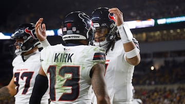 PITTSBURGH, PENNSYLVANIA - JANUARY 12: Christian Kirk #13 of the Houston Texans and C.J. Stroud #7 of the Houston Texans celebrate after a touchdown in the second quarter of an NFL wild card playoff game against the Pittsburgh Steelers at Acrisure Stadium on January 12, 2026 in Pittsburgh, Pennsylvania. Justin K. Aller/Getty Images/AFP (Photo by Justin K. Aller / GETTY IMAGES NORTH AMERICA / Getty Images via AFP)