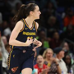 What position does Caitlin Clark play with the Indiana Fever?