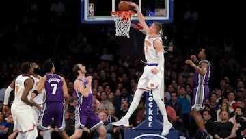 NEW YORK, NY - NOVEMBER 11: Kristaps Porzingis #6 of the New York Knicks dunks the ball against the Sacramento Kings in the first half during their game at Madison Square Garden on November 11, 2017 in New York City. NOTE TO USER: User expressly acknowledges and agrees that, by downloading and or using this photograph, User is consenting to the terms and conditions of the Getty Images License Agreement. Abbie Parr/Getty Images/AFP
== FOR NEWSPAPERS, INTERNET, TELCOS & TELEVISION USE ONLY ==