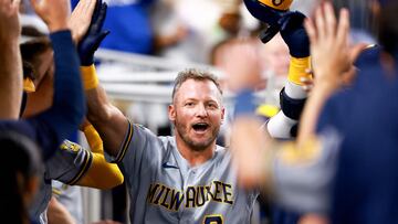 MIAMI, FLORIDA - SEPTEMBER 22: Josh Donaldson #3 of the Milwaukee Brewers celebrates with teammates in the dugout during second inning of the game against the Miami Marlins at loanDepot park on September 22, 2023 in Miami, Florida.   Megan Briggs/Getty Images/AFP (Photo by Megan Briggs / GETTY IMAGES NORTH AMERICA / Getty Images via AFP)