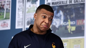 France's forward Kylian Mbappe arrives at a press conference in Marseille, southern France, on March 25, 2024, on the eve of a friendly football match between France and Chile at the Velodrome stadium. (Photo by FRANCK FIFE / AFP)