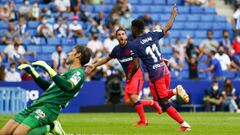 Atletico Madrid&#039;s Thomas Lemar, left, celebrates after scoring his side&#039;s second goal during the Spanish La Liga soccer match between RCD Espanyol and Atletico Madrid at the Cornella-El Prat stadium in Barcelona, Spain, Sunday, Sept. 12, 2021. (