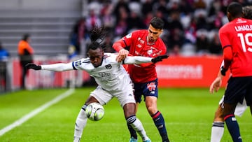 Alberth ELIS of Bordeaux and Zeki CELIK of Lille during the French Ligue 1 Uber Eats soccer match between Lille and Bordeaux on April 2, 2022 in Lille, France. (Photo by Baptiste Fernandez/Icon Sport via Getty Images)