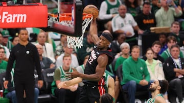 BOSTON, MASSACHUSETTS - MAY 29: Jimmy Butler #22 of the Miami Heat dunks the ball against Jaylen Brown #7 of the Boston Celtics during the fourth quarter in game seven of the Eastern Conference Finals at TD Garden on May 29, 2023 in Boston, Massachusetts. NOTE TO USER: User expressly acknowledges and agrees that, by downloading and or using this photograph, User is consenting to the terms and conditions of the Getty Images License Agreement.   Maddie Meyer/Getty Images/AFP (Photo by Maddie Meyer / GETTY IMAGES NORTH AMERICA / Getty Images via AFP)