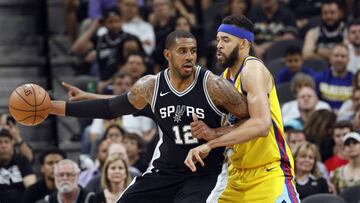 Mar 19, 2018; San Antonio, TX, USA; San Antonio Spurs power forward LaMarcus Aldridge (12) posts up against Golden State Warriors center JaVale McGee (right) during the second half at AT&T Center. Mandatory Credit: Soobum Im-USA TODAY Sports