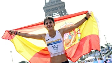Silver medalist Spain's Maria Perez celebrates after the women's 20km race walk of the athletics event at the Paris 2024 Olympic Games at Trocadero in Paris on August 1, 2024. (Photo by Paul ELLIS / AFP)