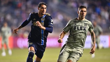 Apr 26, 2023; Chester, PA, USA; Philadelphia Union forward Julian Carranza (9) and Los Angeles FC defender Ryan Hollingshead (24) chase a loose ball in the first half at Subaru Park. Mandatory Credit: Kyle Ross-USA TODAY Sports