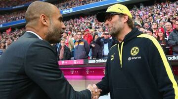 Jurgen Klopp greets Pep Guardiola during their respective spells in Germany