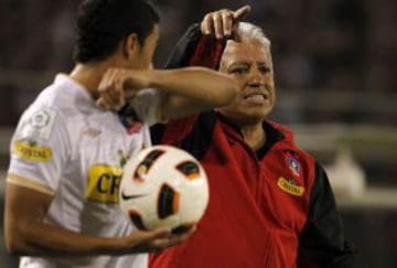 Américo Gallego da instrucciones a Paulo Magalhaes (2011).