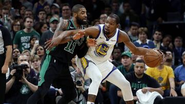 Jan 26, 2019; Boston, MA, USA; Golden State Warriors forward Kevin Durant (35) works against Boston Celtics guard Kyrie Irving (11) during the second half of a 115-111 victory by Golden State at TD Garden. Mandatory Credit: Winslow Townson-USA TODAY Sport