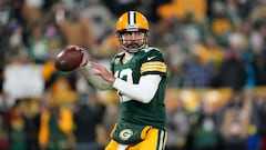 GREEN BAY, WISCONSIN - JANUARY 08: Aaron Rodgers #12 of the Green Bay Packers warms up prior to the game against the Detroit Lions at Lambeau Field on January 08, 2023 in Green Bay, Wisconsin.   Patrick McDermott/Getty Images/AFP (Photo by Patrick McDermott / GETTY IMAGES NORTH AMERICA / Getty Images via AFP)