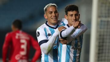 AVELLANEDA, ARGENTINA - MAY 25: Tom&aacute;s Chancalay (R) of Racing Club celebrates with teammate Enzo Copetti after scoring the first goal of his team during a group E match of Copa CONMEBOL Libertadores 2021 between Racing Club and Rentistas at Presidente Peron Stadium on May 25, 2021 in Avellaneda, Argentina. (Photo by Agustin Marcarian - Pool/Getty Images)