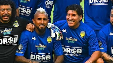 Team RC3 Brazilian football player Roberto Carlos (L) pose for a photo during "The Beautiful Game" a celebrity football match at DRV PNK stadium in Fort Lauderdale, Florida on June 18, 2022. (Photo by CHANDAN KHANNA / AFP)