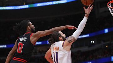 CHICAGO, ILLINOIS - FEBRUARY 22: Ricky Rubio #11 of the Phoenix Suns puts up a shot past Coby White #0 of the Chicago Bulls at the United Center on February 22, 2020 in Chicago, Illinois. The Suns defeated the Bulls 112-104. NOTE TO USER: User expressly acknowledges and agrees that, by downloading and or using this photograph, User is consenting to the terms and conditions of the Getty Images License Agreement.   Jonathan Daniel/Getty Images/AFP
 == FOR NEWSPAPERS, INTERNET, TELCOS &amp; TELEVISION USE ONLY ==