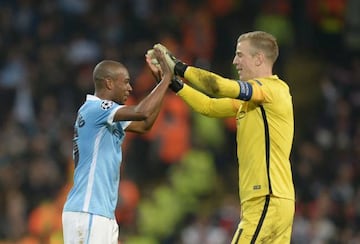 Joe Hart embraces Fernandinho, who scored in the first leg