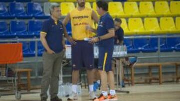 Xavi Pascual (derecha), con Juan Carlos Navarro.