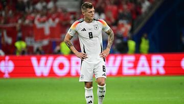 Germany's midfielder #08 Toni Kroos waits with the ball during the UEFA Euro 2024 Group A football match between Switzerland and Germany at the Frankfurt Arena in Frankfurt am Main on June 23, 2024. (Photo by Tobias SCHWARZ / AFP)