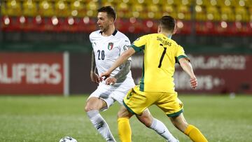 Soccer Football - World Cup Qualifiers Europe - Group C - Lithuania v Italy - LFF stadionas, Vilnius, Lithuania - March 31, 2021 Italy's Federico Bernardeschi in action with Lithuania's Gratas Sirgedas REUTERS/Ints Kalnins