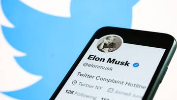 Elon Musk's Twitter account displayed on a phone screen and Twitter logo displayed on a laptop screen are seen in this illustration photo taken in Krakow, Poland on November 1, 2022. (Photo by Jakub Porzycki/NurPhoto via Getty Images)