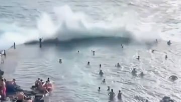 Ola gigante impactando contra piscina natural en Los Gigantes, Tenerife, diciembre 2025
