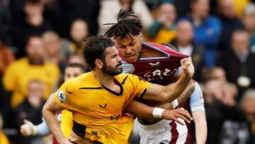 Soccer Football - Premier League - Wolverhampton Wanderers v Aston Villa - Molineux Stadium, Wolverhampton, Britain - May 6, 2023 Wolverhampton Wanderers' Diego Costa in action with Aston Villa's Tyrone Mings Action Images via Reuters/Jason Cairnduff EDITORIAL USE ONLY. No use with unauthorized audio, video, data, fixture lists, club/league logos or 'live' services. Online in-match use limited to 75 images, no video emulation. No use in betting, games or single club /league/player publications. Please contact your account representative for further details. TPX IMAGES OF THE DAY