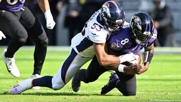 BALTIMORE, MARYLAND - DECEMBER 04: Jonathon Cooper #53 of the Denver Broncos sacks Lamar Jackson #8 of the Baltimore Ravens in the first half of a game at M&T Bank Stadium on December 04, 2022 in Baltimore, Maryland. Greg Fiume/Getty Images/AFP (Photo by Greg Fiume / GETTY IMAGES NORTH AMERICA / Getty Images via AFP)