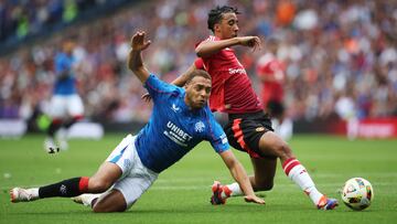 Soccer Football - Pre Season Friendly - Rangers v Manchester United - Murrayfield Stadium, Edinburgh, Scotland, Britain - July 20, 2024 Rangers' Cyriel Dessers in action with Manchester United's Leny Yoro Action Images via Reuters/Ed Sykes