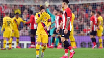 Barcelona&#039;s Argentinian forward Lionel Messi (L) gestures during the Spanish Copa del Rey (King&#039;s Cup) quarter-final football match Athletic Club Bilbao against FC Barcelona at the San Mames stadium in Bilbao on February 06, 2020. (Photo by ANDE