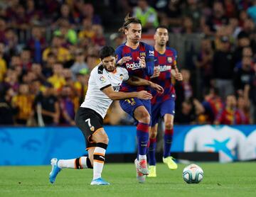 Griezmann y Guedes.