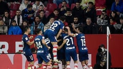 Athletic Bilbao's Spanish defender #04 Aitor Paredes celebrates scoring his team's second goal with teammates during the Spanish league football match between Sevilla FC and Athletic Club Bilbao at the Ramon Sanchez Pizjuan stadium in Seville on January 4, 2024. (Photo by CRISTINA QUICLER / AFP)