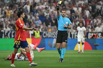 Vincic books Spain's Jesús Navas during the UEFA Euro 2024 semi-final between La Roja and France in Munich.