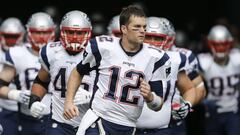 Jan 1, 2017; Miami Gardens, FL, USA;  New England Patriots quarterback Tom Brady (12) leads his team out of the tunnel before an NFL football game against the Miami Dolphins at Hard Rock Stadium. The Patriots won 35-14. Mandatory Credit: Reinhold Matay-USA TODAY Sports