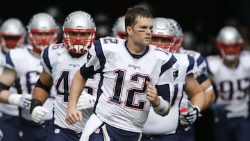 Jan 1, 2017; Miami Gardens, FL, USA; New England Patriots quarterback Tom Brady (12) leads his team out of the tunnel before an NFL football game against the Miami Dolphins at Hard Rock Stadium. The Patriots won 35-14. Mandatory Credit: Reinhold Matay-USA TODAY Sports