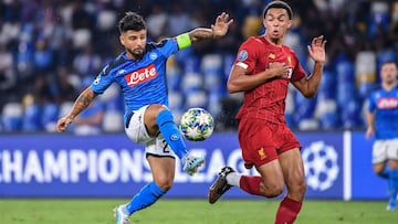 Napoli&#039;s Italian forward Lorenzo Insigne (L) challenges Liverpool&#039;s English defender Trent Alexander-Arnold during the UEFA Champions League Group E football match Napoli vs Liverpool on September 17, 2019 at the San Paolo stadium in Naples. (Ph