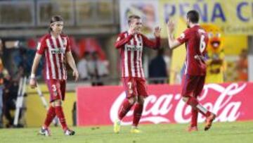 Filipe Luis, Griezmann y Koke celebran los goles del francés.