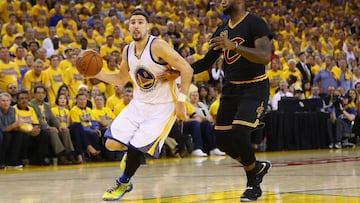 OAKLAND, CA - JUNE 13: Klay Thompson #11 of the Golden State Warriors dribbles against LeBron James #23 of the Cleveland Cavaliers during the second half in Game 5 of the 2016 NBA Finals at ORACLE Arena on June 13, 2016 in Oakland, California. NOTE TO USER: User expressly acknowledges and agrees that, by downloading and or using this photograph, User is consenting to the terms and conditions of the Getty Images License Agreement.   Ezra Shaw/Getty Images/AFP
 == FOR NEWSPAPERS, INTERNET, TELCOS &amp; TELEVISION USE ONLY ==