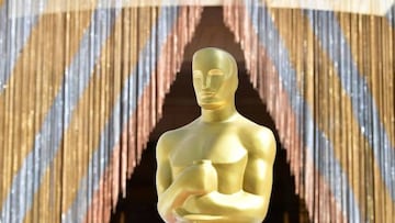 A statue of the Oscar is seen on a tarp-covered red carpet as preparations continue in the red carpet arrivals area along Hollywood Boulevard on March 25, 2022 in Hollywood, California, ahead of the 94th Academy Awards here on March 27. (Photo by Frederic J. BROWN / AFP) (Photo by FREDERIC J. BROWN/AFP via Getty Images)